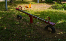 Empty Rides In Playground. Absence Of Children, Low Birth Rate. Old Country, No Children.