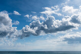 Fototapeta Na sufit -  The tropical sea under the blue sky and clouds