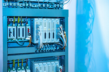 Poster - cabinet with electrical equipment. network equipment in a metal cabinet. server equipment box. close