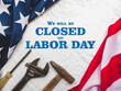 © Svetlana - LABOR DAY. Hand tools and the Flag of the United States of America lying on the table. View from above, close-up. Congratulations to family, relatives, friends and colleagues. National holiday concept