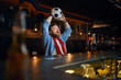 © Nomad_Soul - Football fan with ball sitting at counter in bar