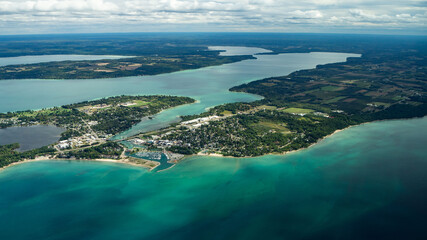 Aerial of Elk Rapids, Elk Lake, and Lake Michigan.