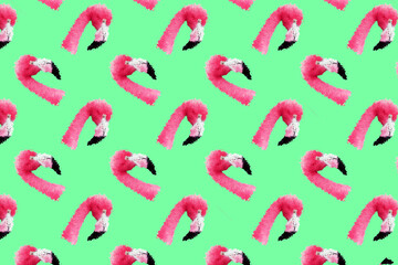 Modern design, worn pink flamingo head on a turquoise background. Bright trendy colors, shocking art, style for a magazine, fashionable web design. copy the space.