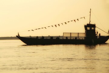 Typical portuguese boats called Rabelos crossing the Douro River