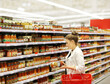 © lado2016 - Woman choosing a dairy products at supermarket