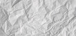 Gray blank creased paper texture. Crumpled paper sheet background.