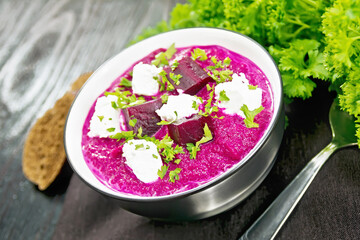 Poster - Soup puree of beetroot with salted cheese in bowl on black board