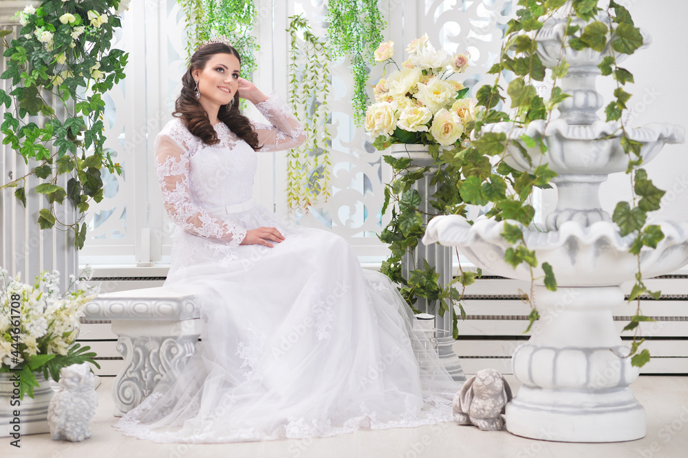 portrait of young beautiful bride in white dress posing - obrazy, fototapety, plakaty 