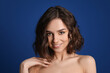 © Pixel-Shot - Beautiful young woman on color background