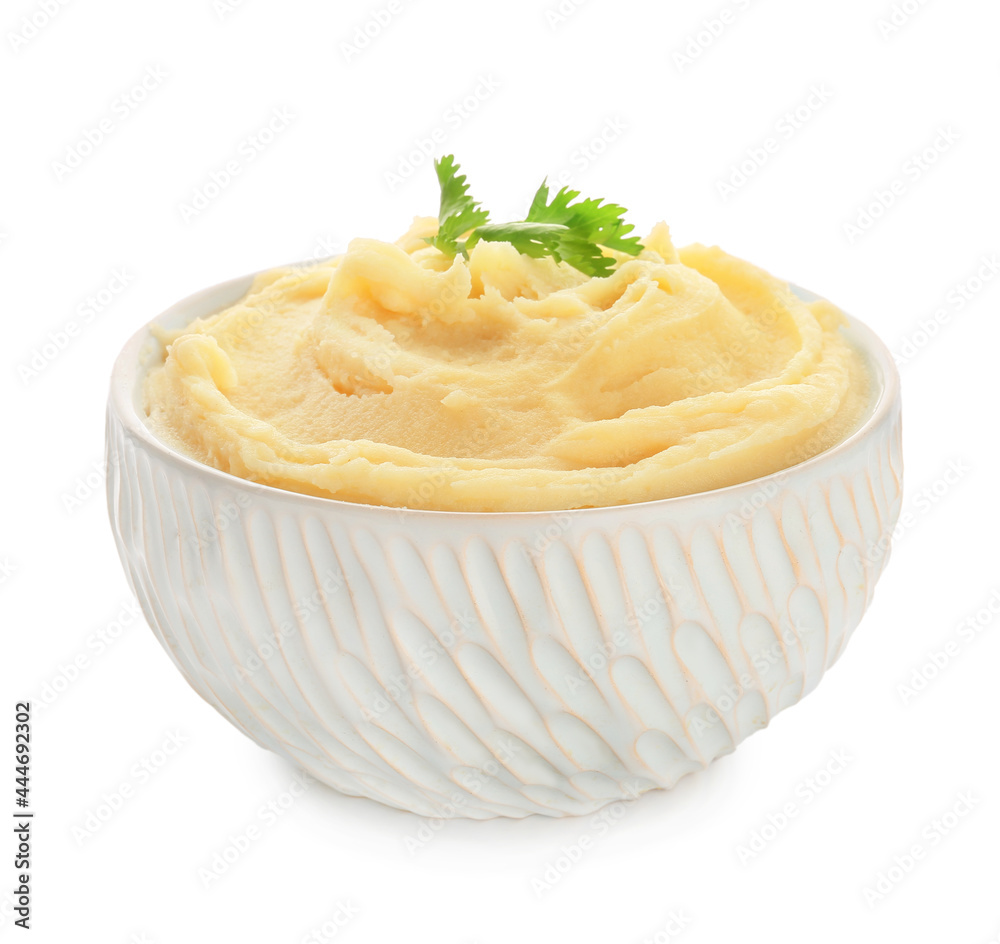 Bowl with tasty mashed potatoes on white background