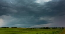 Time-lapse Video Of An Intense Rotating Supercell Thunderstorm, With Impressive Lightning Strikes, Dark Skies And Mesocyclone Storm Structure.
