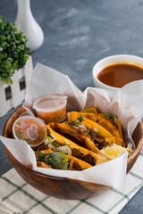 a bowl of delicious birria tacos; It's a dish that is very popular in Mexico that consist of goat meat or beef, stewed in perfection