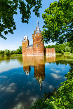 Charming Beersel Castle. The Walls And Towers Of A Medieval Castle. The Castle And The Reflection In The Moat. Beersel Flanders, Belgium