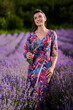 © Xalanx - Young woman in a lavender field at sunset