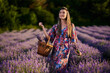 © Xalanx - Young woman with a basket in a lavender field