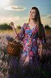 © Xalanx - Young woman with a basket in a lavender field