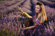 © Xalanx - Young woman with a basket in a lavender field