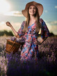 © Xalanx - Young woman with a basket in a lavender field