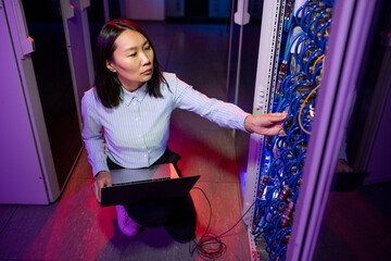 Poster - Asian Woman Working in Server Room