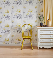 Wallpaper background in the room, wooden furniture white cabinet and chair, yellow carpet and brown parquet style.