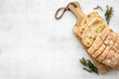 Sliced bread ciabatta with rosemary. Breakfast background