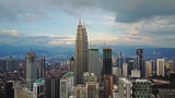 Fototapeta  - Aerial view of Kuala Lumpur cityscape. Photo from a drone of Asian skyscrapers.