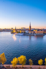 Beautiful panoramic view of Stockholm skyline in Stockholm city, Sweden, popular tourist destination in Scandinavia. Sunset, summer evening - polar day at Monteliusvägen at Södermalm.