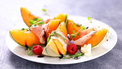 Wall Mural - melon salad with ham and sauce