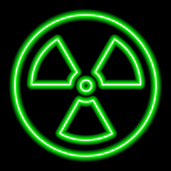 Green neon radiation icon on a black background