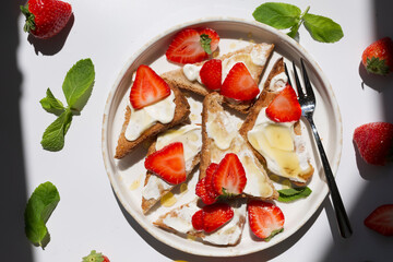 Wall Mural - Healthy food breakfast strawberry toast with butter cream