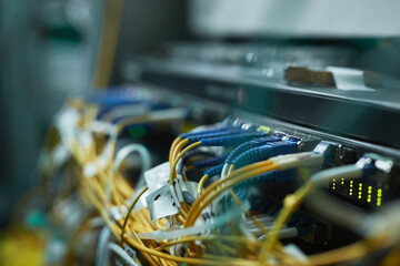 Wall Mural - Close up background image of blade servers in server cabinet at supercomputer or data center, copy space