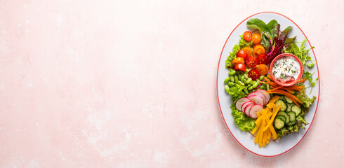 Wall Mural - Healthy chopped salad with fresh vegetables, sprouts and sauce. Concept clean eating. Top view.