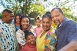 © Trevor Adeline/Caia Image - Portrait happy multigenerational family in summer park