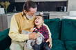 © Ivan - Loving grandfather. happy grandfather and grandson hugging, cheerful and playing while relaxing on the sofa at home. Family, love and care concept