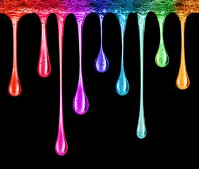 Wall Mural - Colored glowing stretched drops on a black background