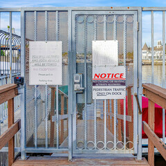 Canvas Print - Square Warning signs and notices at the gate of a dock in Huntington Beach neighborhood