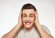 © SHOTPRIME STUDIO - smiling man in light t-shirt gesturing with hands emotions cropped view studio