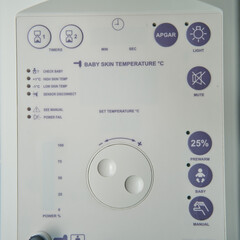 Wall Mural - A device for resuscitation of infants and checking the child on the Apgar scale after delivery. Machine for oxygen supply and resuscitation of the baby after childbirth