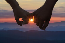 Couple Hold Hands In Nature On Tof Of Mountain  Insunset Time,vacation And Relax Concept,copy Space For Text.