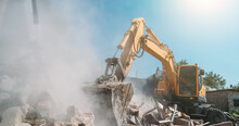 Destruction Of Old House By Excavator. Bucket Of Excavator Breaks Concrete Structure.