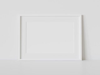 Aufkleber - White frame leaning on white floor in interior mockup. Template of a picture framed on a wall 3D rendering