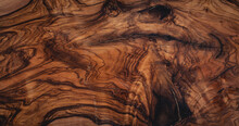 Texture Of Dark Brown Olive Wood Plank. Background Of Wooden Surface
