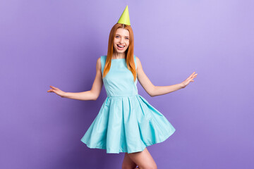 Wall Mural - Photo of young girl happy positive smile wear birthday cone party holiday isolated over purple color background