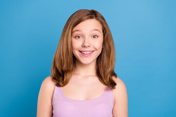 Poster - Photo of funny brown hairdo teen girl wear violet top isolated on blue color background