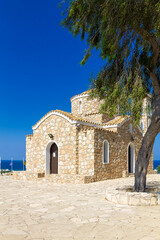  Cyprus, Protaras - 22 June 2021. Church of Saint Elias (Ayios Ilias,  Profitis Elias). An ancient 14th-century Orthodox church on top of a small mountain, overlooking the whole village.