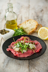 Poster - beef carpaccio with arugula capers and parmesan cheese