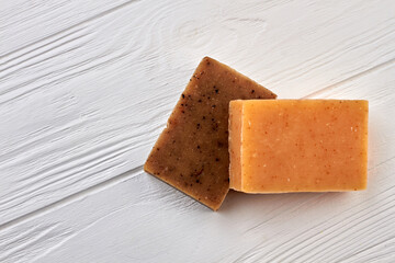 Wall Mural - Close-up two homemade brown soap bars for spa.