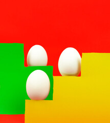 Bright multicolored art abstraction with three eggs