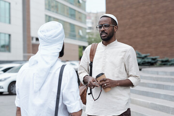 Poster - Muslim Man Drinking Coffee With Business Partner