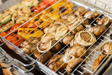 vegetables are cooked on a grill